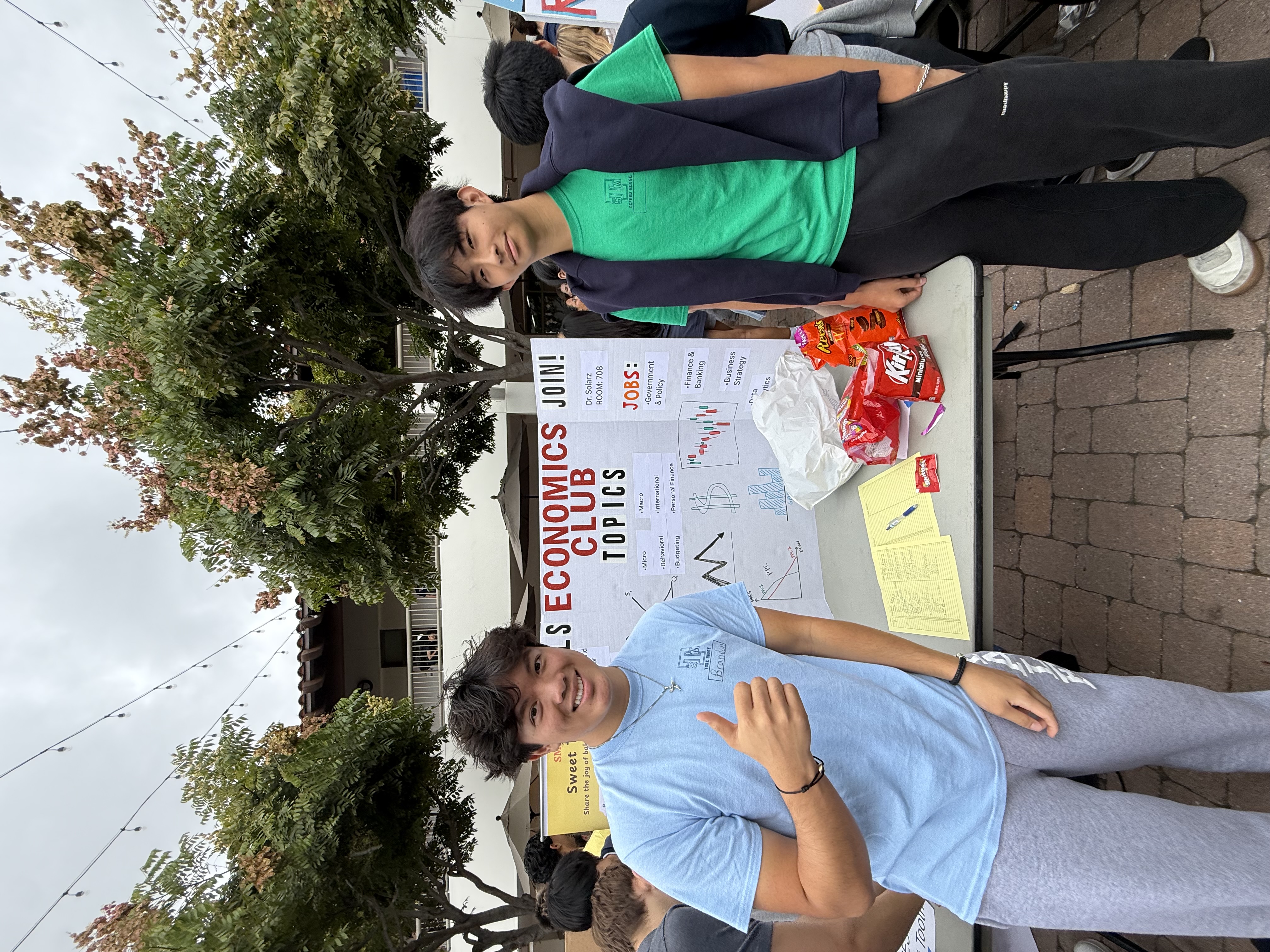 Brandon at the Economics Club recruitment table at St. Margaret's